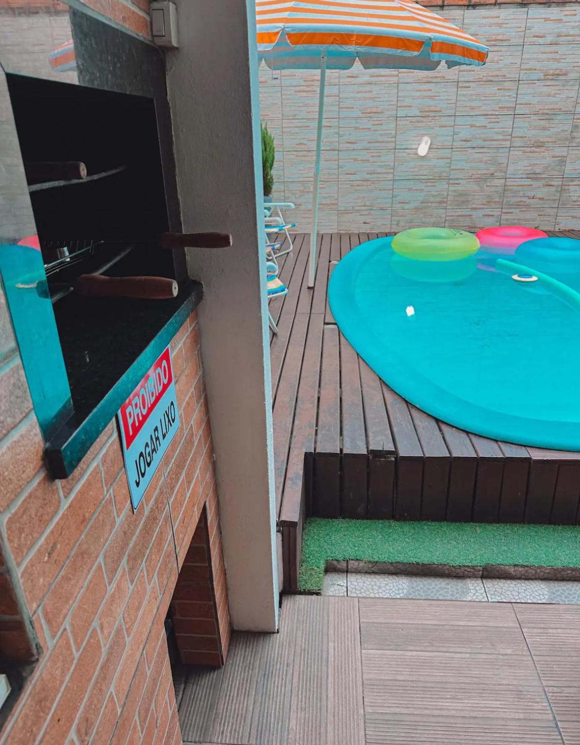 Casa Com Piscina Em *